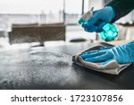 Sanitizing surfaces cleaning...