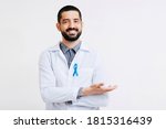 Small photo of Prostate Cancer Awareness. Doctor man holding light Blue Ribbon for supporting people living and illness. Men Healthcare and World cancer day concept
