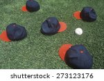 Baseball caps and ball on field, Candlestick Park, San Francisco, CA
