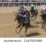 Small photo of Saratoga Springs, NY, USA - August 25, 2018: Whitmore ridden by Ricardo Santana, Jr. in the stretch run of the Forego Stakes on Travers day August 25, 2018 Saratoga Springs, NY, USA