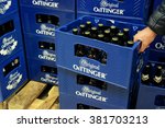 Small photo of GERMANY - DECEMBER 21, 2015: Oettinger beer crates in a Hypermarket. Oettinger has been Germany's best selling beer brand. Various German beers are discredited because of poison residues in beer.