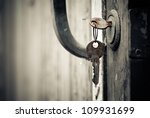 rusty keys in old door lock