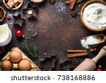Christmas Baking background. Ingredients for cooking christmas baking on dark stone background. Top view with copy space.