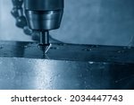 Small photo of The hole chamfering process by chamfer tool on NC milling machine. The shop floor operation by NC milling machine.