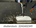 Small photo of The CNC milling machine cutting the nylon 6 material part with ball end mill tool. The jig and fixture parts cutting process by machining center with ball nose end mill.