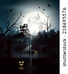 scary house and graveyard in... | Shutterstock .eps vector #218695576