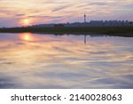 Small photo of Sunset reflexion on Danube river in Galati, Romania