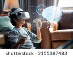 Asian little boy with vr...