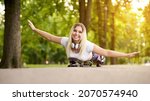 young cheerful skateboarder... | Shutterstock . vector #2070574940