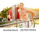 millennial athletic muscular... | Shutterstock . vector #2070574943