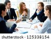 https://thumb1.shutterstock.com/thumb_small/91282/125338154/stock-photo-image-of-business-partners-discussing-documents-and-ideas-at-meeting-125338154.jpg